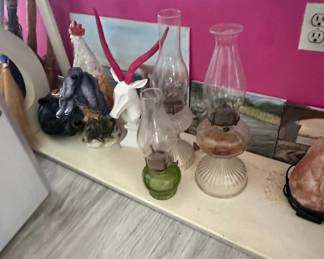 Assorted Vintage Oil Lamps and Decorative Figurines, including Green Glass Finger Lamp and Antelope Bust