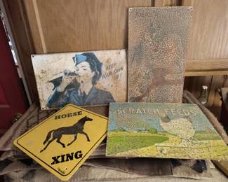 Assorted tin signs