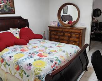 Sleigh bed, dresser with mirror bedroom set. Sold separately or as a set. Pieces are all solid hardwood. You'll need to bring help to move them.