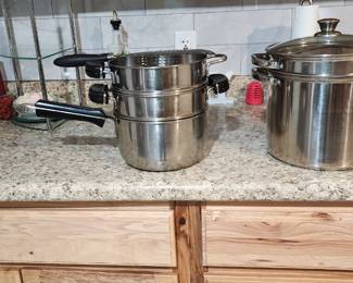 Stainless Seafood Boil / Steamer Pot Set Include: large stock pot perforated insert lid extra tray Price: $65