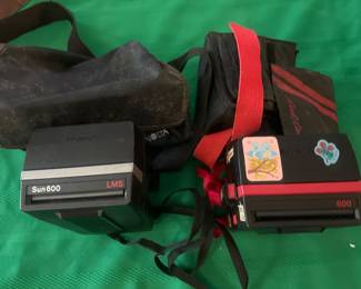 Polaroid Sun 600 and Cool Cam 600 Instant Cameras. 