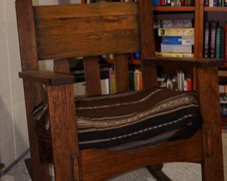 An early 1900's quarter sawn rocker . masculine size. No labels noted,