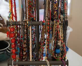 Just a sampling of a collection of jewelry necklaces, earrings and rings