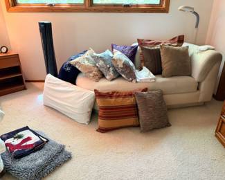 Chaise lounge and throw pillows