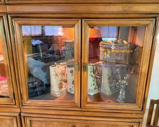 Fashion purses, hat pins, and oriental lit display case