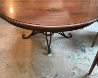 Round Mahogany Dining Table with Wrought Iron Pedestal Base