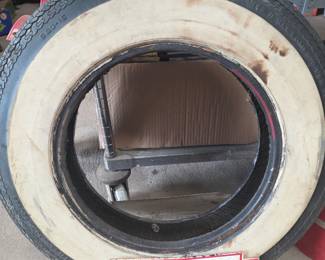 Vintage Firestone tire stand w/tire