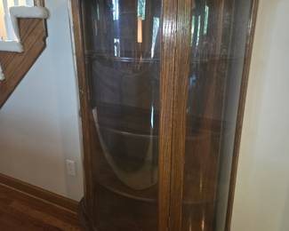 Antique curved glass curio cabinet