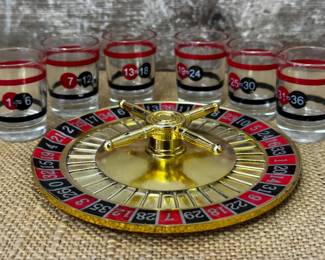 Mini shot glasses and roulette wheel