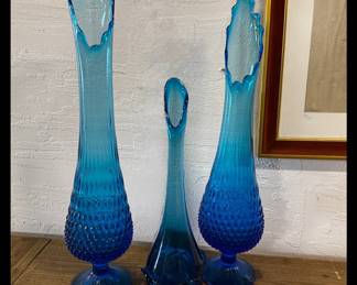 Trio of blue swung glass footed vases