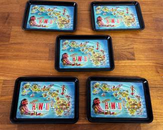 Set of five souvenir Hawaiian trays