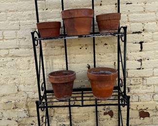 Metal bakers rack with seven pots