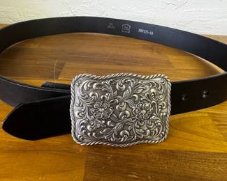 Large silver toned belt buckle and xl leather belt