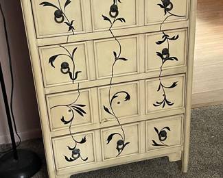 Antique dresser with newer unique paint job 