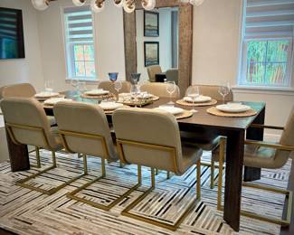Restoration Hardware “Arles” dining table and 10 leather and brushed gold dining chairs 