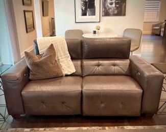 Brown leather reclining sofa