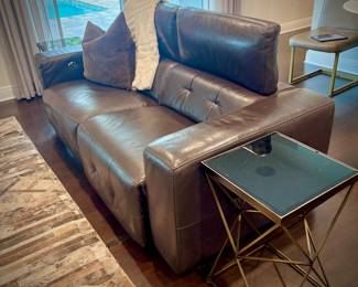 Brown leather reclining sofa