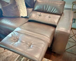 Brown leather reclining sofa