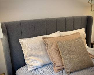 Queen bed with new mattress and upholstered headboard 