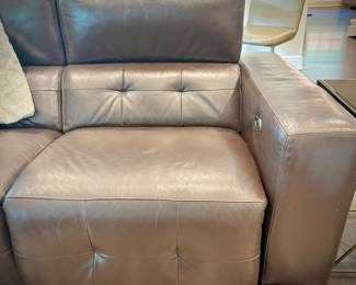 Brown leather reclining sofa