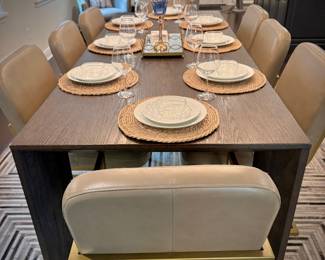 Restoration Hardware “Arles” dining table and 10 leather and brushed gold dining chairs