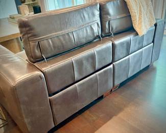 Brown leather reclining sofa