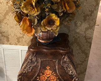Ornate floral accent cabinet, faux flowers