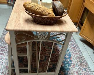 stools (2), small luncheon table, baskets, rug