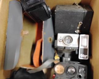 Box of vintage cameras