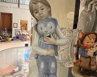 Nao by Lladro Porcelain Figurine - Girl Embracing Blue Teddy Bear