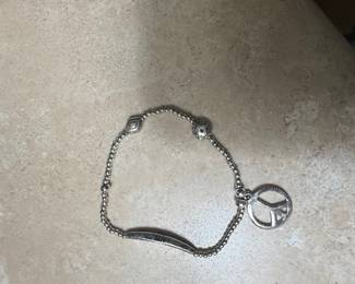 Silver Tone Peace Sign Charm Bracelet