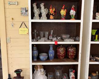 Vintage porcelain doll, ceramic roosters, Waterford crystal