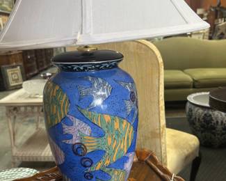 Cylindrical lamp with fish motif