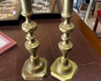 Antique push up brass candlesticks