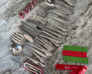 Stainless flatware, steak knives, kitchen utensils, etc