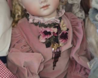 Victorian-style Porcelain Doll in Pink Velvet Gown