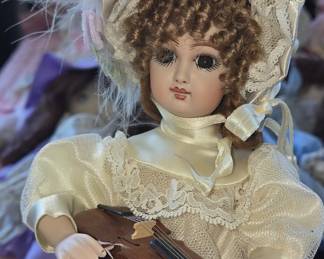 Victorian-style Porcelain Doll with Violin and Music Box Base