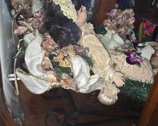 Victorian-style Porcelain Doll with Tea Set