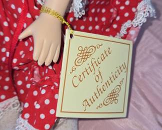 Porcelain Doll with Red Polka Dot Dress and Wind-Up Mechanism