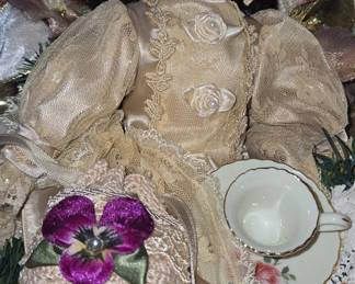 Victorian-style Porcelain Doll with Tea Set