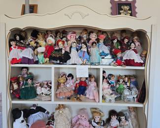 Collection of Madam Alexander Dolls and Vintage Dolls in Display Cabinet