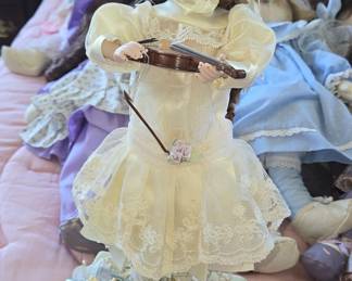 Victorian-style Porcelain Doll with Violin and Music Box Base