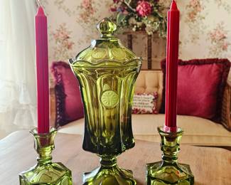 Green Fostoria coin lidded urn with matching candle sticks. Sold as set.