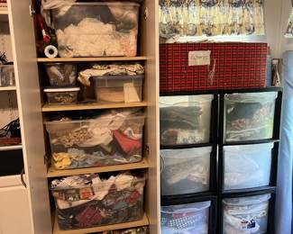 Another view of the fully stocked craft room. Includes sewing patterns, and a lot of fabric.
