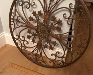 Round wrought-iron wall decor