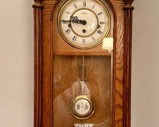 Howard Miller oak wall clock