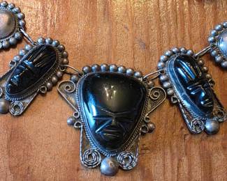 Mexican silver carved onyx tribal face necklace, part of a set with a ring and bracelet