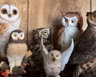 Owl statues of various shapes, sizes and materials