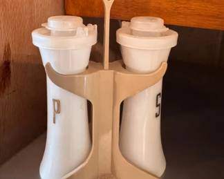 Vintage Tupperware salt and pepper shakers in stand/caddy