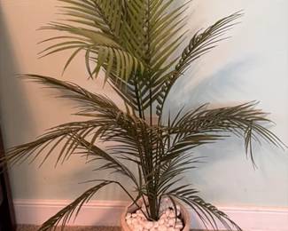 Faux plant in a ceramic pot